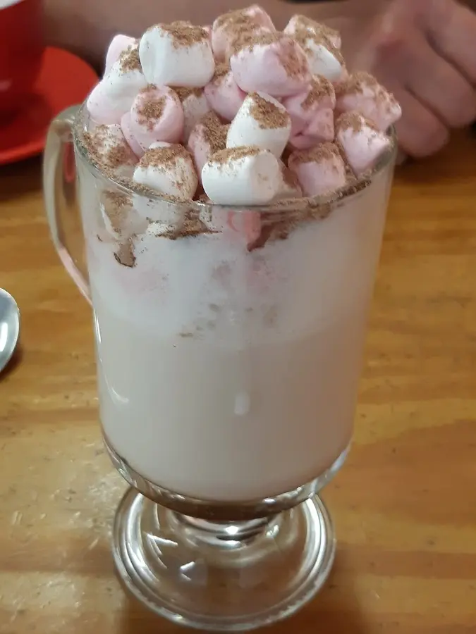Hot chocolate with marshmallows in a glass mug